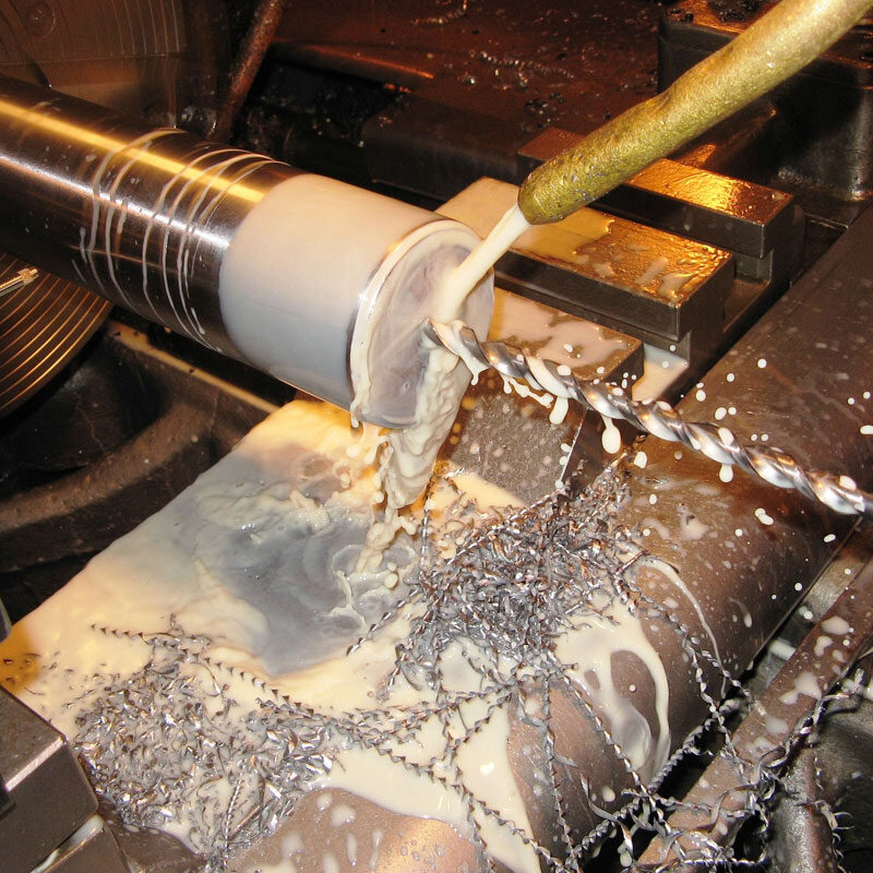 A screw being coated